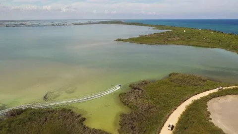 Aerial View of a Boat on the Water at Boca de Paila in Tulum Mexico Video stock 137427770