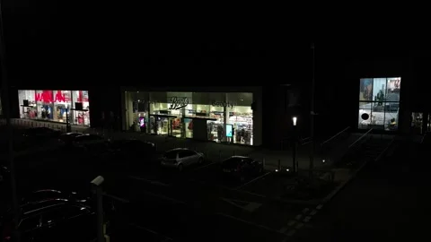 Aerial view of a Boots store at night, pharmacy and beauty Stock Footage 256027153