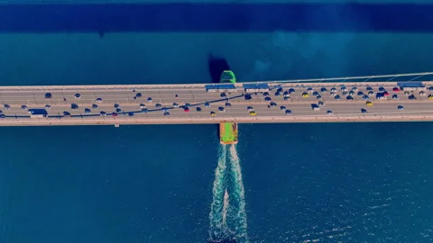 Aerial view of the Bosphorus Bridge with drone on a cloudy day. Tanker ship pass Stock Footage 322912415