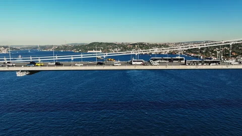 Aerial view of the Bosphorus Bridge with drone on a cloudy day. Tanker ship pass Stock Footage 322913205