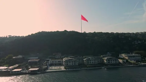 Aerial View of Bosphorus Coastline with Ships and Sunset in Istanbul 4K Stock Footage 303972653