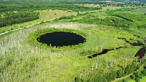 Aerial view of Bottomless  Lake in forest of Solnechnogorsk District Video stock 166775464