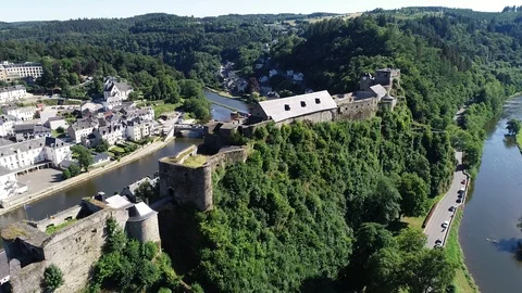 Aerial view of Bouillon Castle surrounded by river and trees, Belgium, Europe Stock Footage 114503796