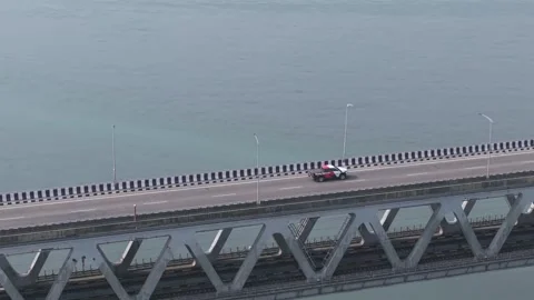 Aerial View of Brahmaputra River Bridge with Sandbars in Arunachal Pradesh 動画素材 332480250