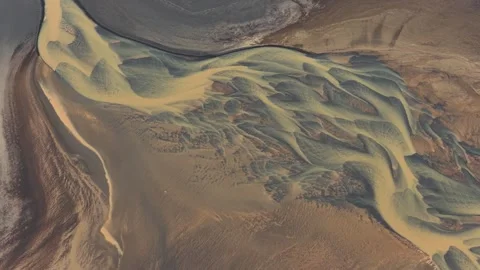 Aerial view of braided glacial river patterns in Iceland. Stock Footage 340282036