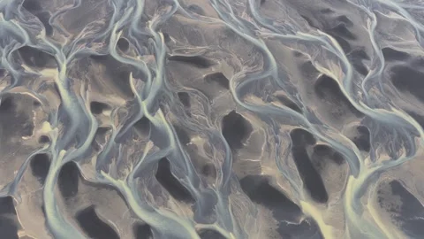 Aerial view of braided river channels in Iceland, ICELAND. Stock Footage 340282291
