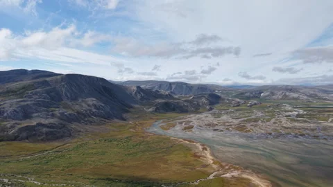 Aerial view of braided river delta and tundra near Lavrentiya Bay, Chukotka Stock Footage 327121156