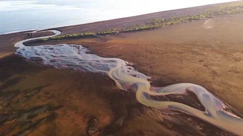Aerial view of braided river in volcanic landscape, Iceland. Stock Footage 341431060