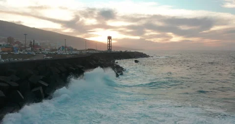 Aerial view. Breaking waves and dangerous rocks, Puerto de la Cruz, Tenerife Stock Footage 144097816