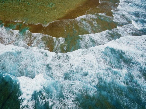 Aerial View of Breaking Waves Stock Footage 84665381