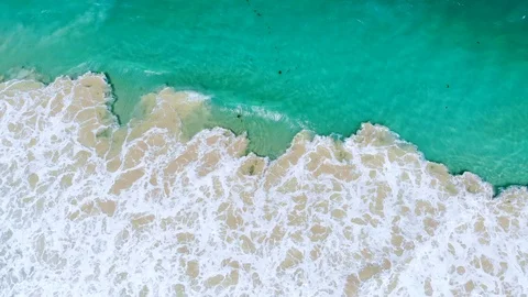 Aerial View of Breaking Waves Stock Footage 115922860