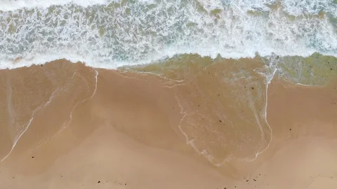 Aerial View of Breaking Waves Stock Footage 115923257