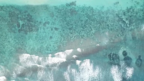 Aerial view of breaking waves in the ocean Stock Footage 100048522