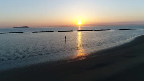 Aerial view of breakwater of stone at sunset Stock Footage 90597103