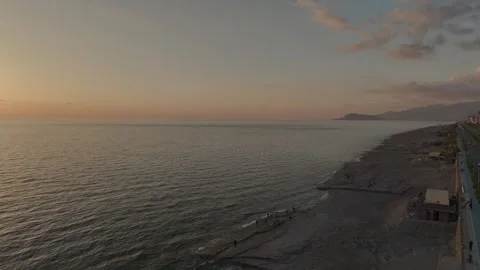 Aerial View: A breathtaking sunset frames the fisherman s boat on the water Stock Footage 296079155