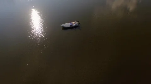 Aerial view of bride and groom on the boat Stock Footage 101148273