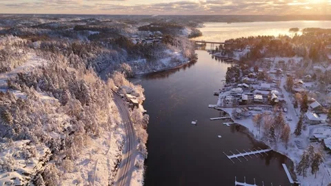 Aerial view of bridge and snow covered forest, Sweden. Stock Footage 325849264