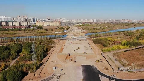 Aerial view of bridge construction site in Astana Stock Footage 215715259