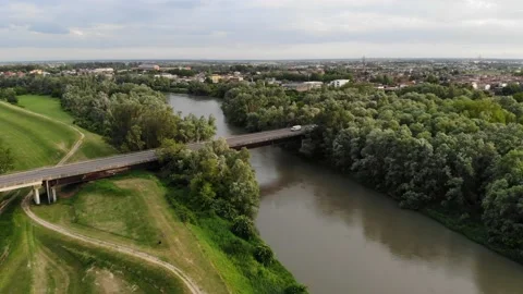 Aerial view of a bridge crossing a river and a forest. Stock Footage 130215574
