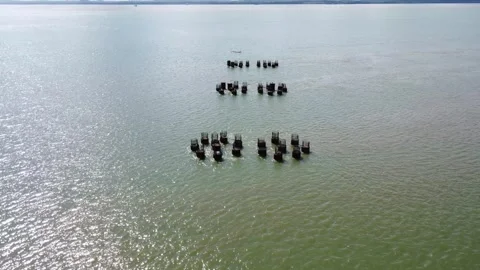 Aerial view of bridge foundations embedded in the seabed Stock Footage 274059382
