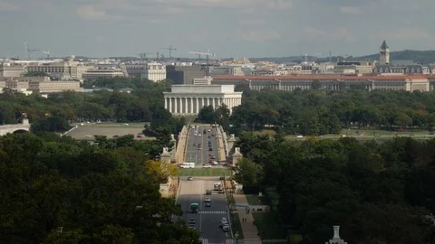 Aerial view of Bridge to Lincoln Memorial  Washington DC zoom out Stock Footage