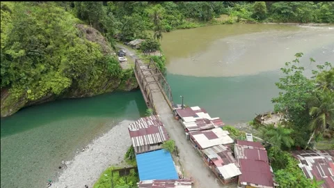 Aerial view of a bridge over clear water in Colombia Video stock 329828192