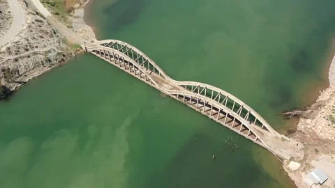 Aerial view of bridge over dam 2 Stock Footage 294091393