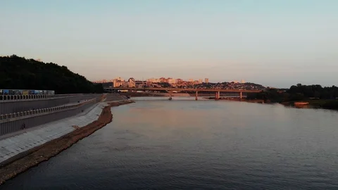 Aerial view of the bridge over the river at sunset Stock Footage 106818503