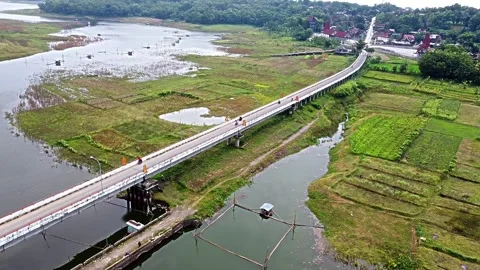Aerial View of a Bridge Over a River Stock Footage 280453940
