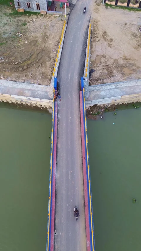 Aerial view of the bridge over the river. View from above. Stock Footage 300415124