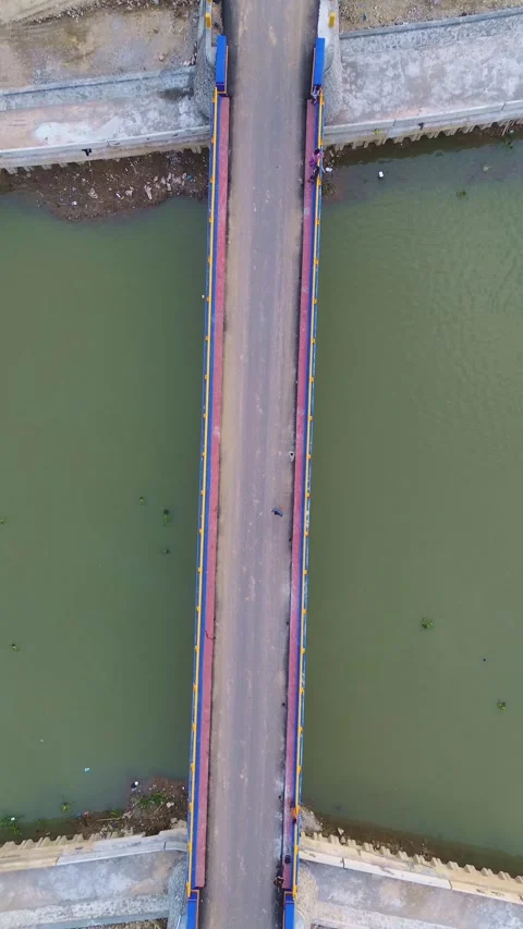 Aerial view of the bridge over the river. View from above. Stock Footage 300415449