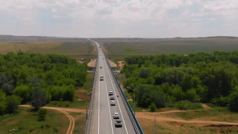 Aerial view of the bridge over the Ural river, summer landscape from above with Stock Footage 145923892