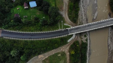 Aerial view of the bridge, river and asphalt road. Stock Footage 118165310