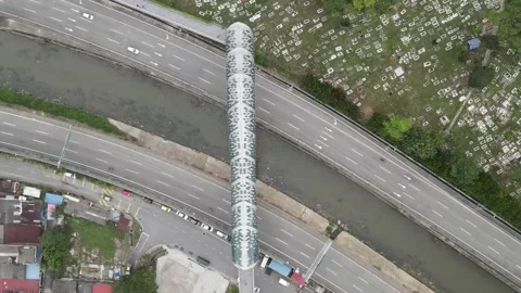 Aerial view of bridge, river, graveyard and highway in Kuala Lumpur Stock Footage 150290686