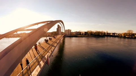 Aerial view of bridge at sunset. people crossing bridge. fly over Video stock 36162353