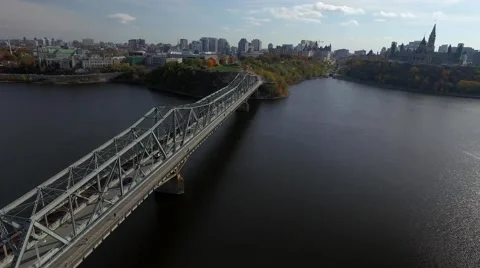 Aerial view of bridge water and city with a rotating camera slider shot Stock Footage