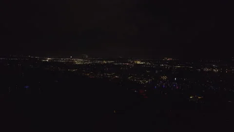 Aerial view of bright fireworks exploding with colorful lights over sea shore on Stock Footage 226543046