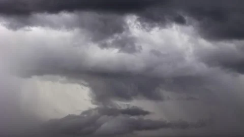 Aerial view of bright lightning storm breaking through heavy dark clouds Stock Footage 314631405