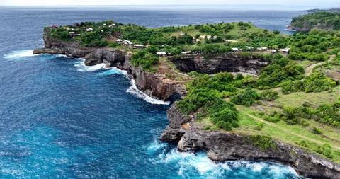 Aerial view of Broken Beach coastal arch and cliffs, Nusa Penida Bali Stock Footage 331213095