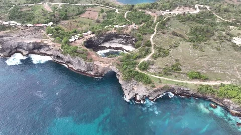 Aerial view of Broken Beach on sunny day. Nusa Penida, Indonesia. Stock Footage 320106197