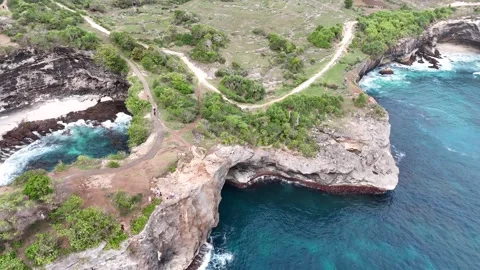 Aerial view of Broken Beach on sunny day. Nusa Penida, Indonesia. Stock Footage 320106996