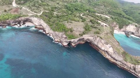 Aerial view of Broken Beach on sunny day. Nusa Penida, Indonesia. Stock Footage 320209782