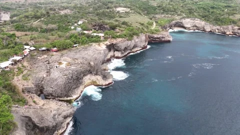 Aerial view of Broken Beach on sunny day. Nusa Penida, Indonesia. Stock Footage 320209861
