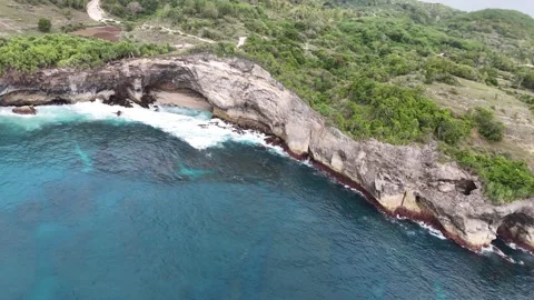 Aerial view of Broken Beach on sunny day. Nusa Penida, Indonesia. Stock Footage 320210084