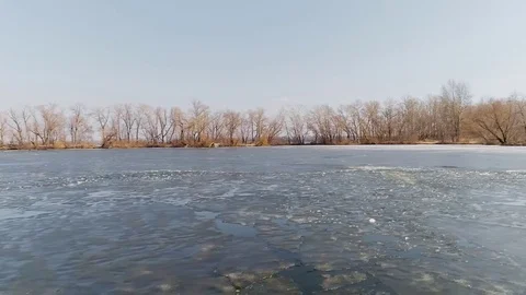 Aerial view of broken ice on the river Stock Footage 73299775