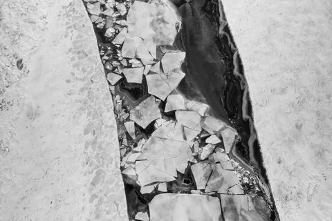 Aerial view of broken layer of ice on Lake Huron near Michigan upper peninsul Stock Photos