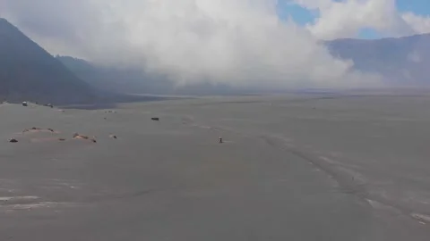 Aerial view of Bromo volcano and sand landscape, Indonesia. Stock Footage 284825770