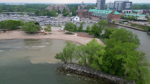 Aerial view of Bronte Beach shoreline and marina district in Oakville Stock Footage 330760197