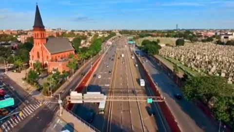 Aerial View Of Brooklyn Queens Expressway Highway And Cemetery NYC Stock Footage 343193836
