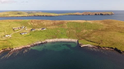 Aerial View of Broonies Taing Beach, Sandwick, Shetland Stock Footage 345473726